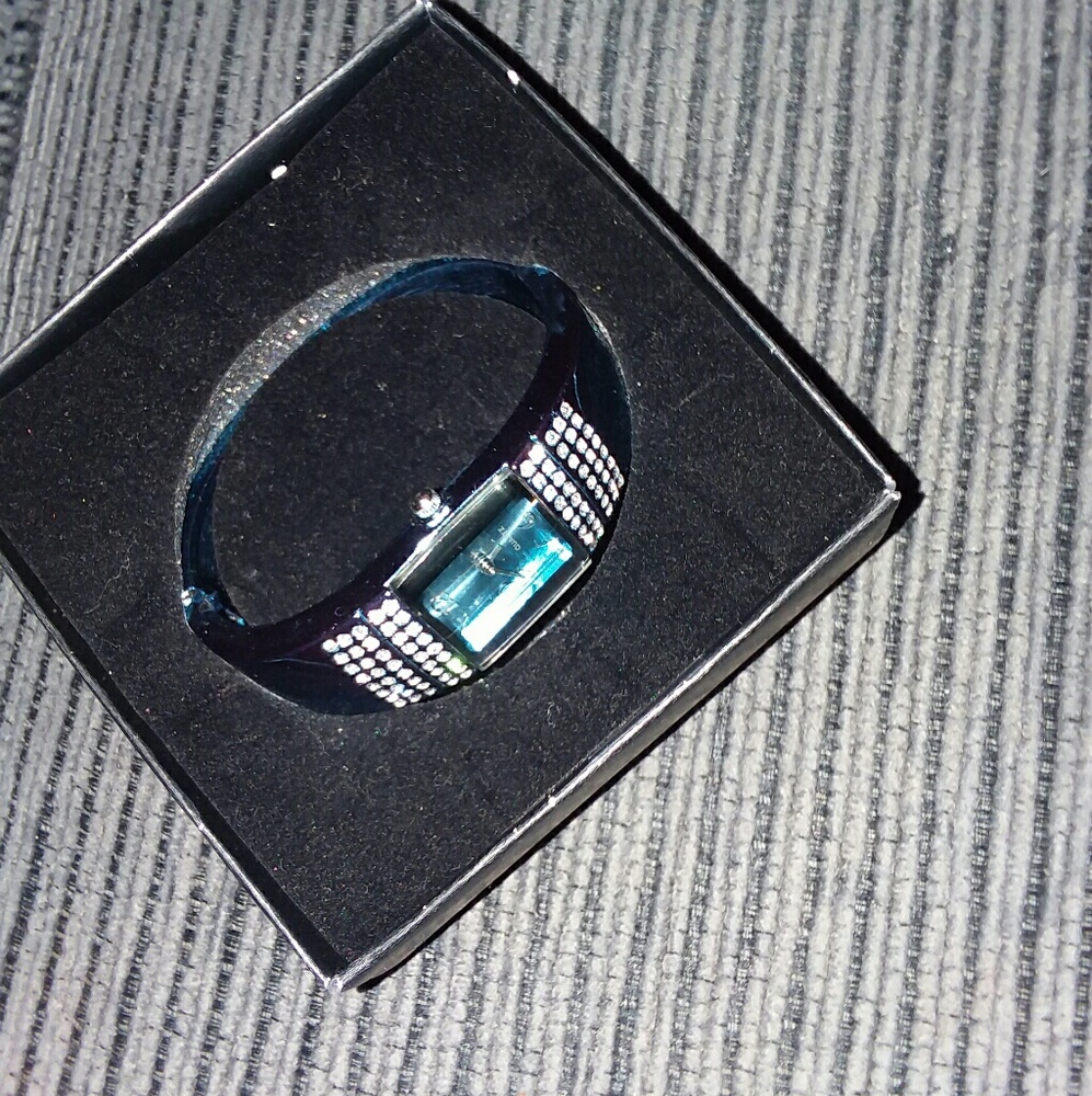 Avon metallic bracelet watch